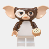 MOGWAI GIZMO GREMLINS CON GALLETA EN BOLSITA Y BASE TIPO LEGO